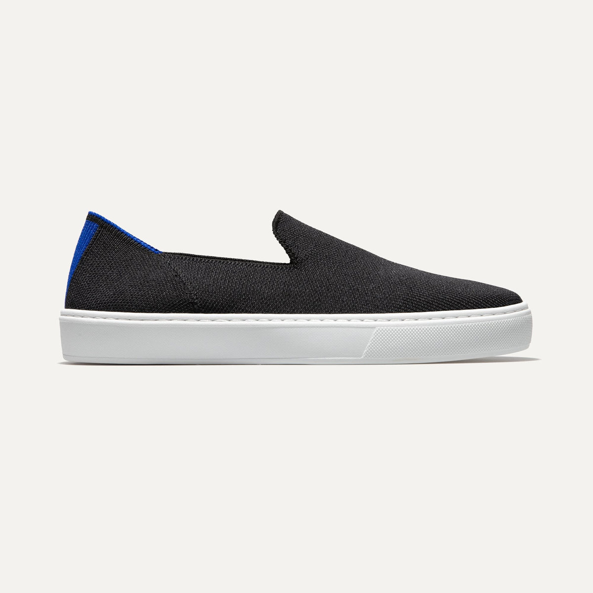 Rothys The Original Slip On Sneaker in Black Solid