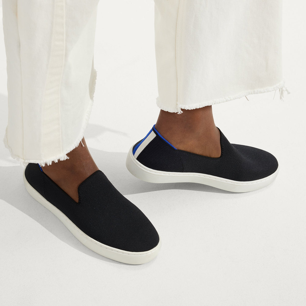 Rothys The Original Slip On Sneaker in Black Solid