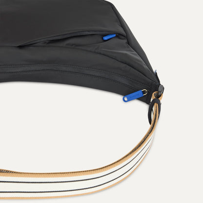 Rothys Lightweight Travel Sling Bag in Ink