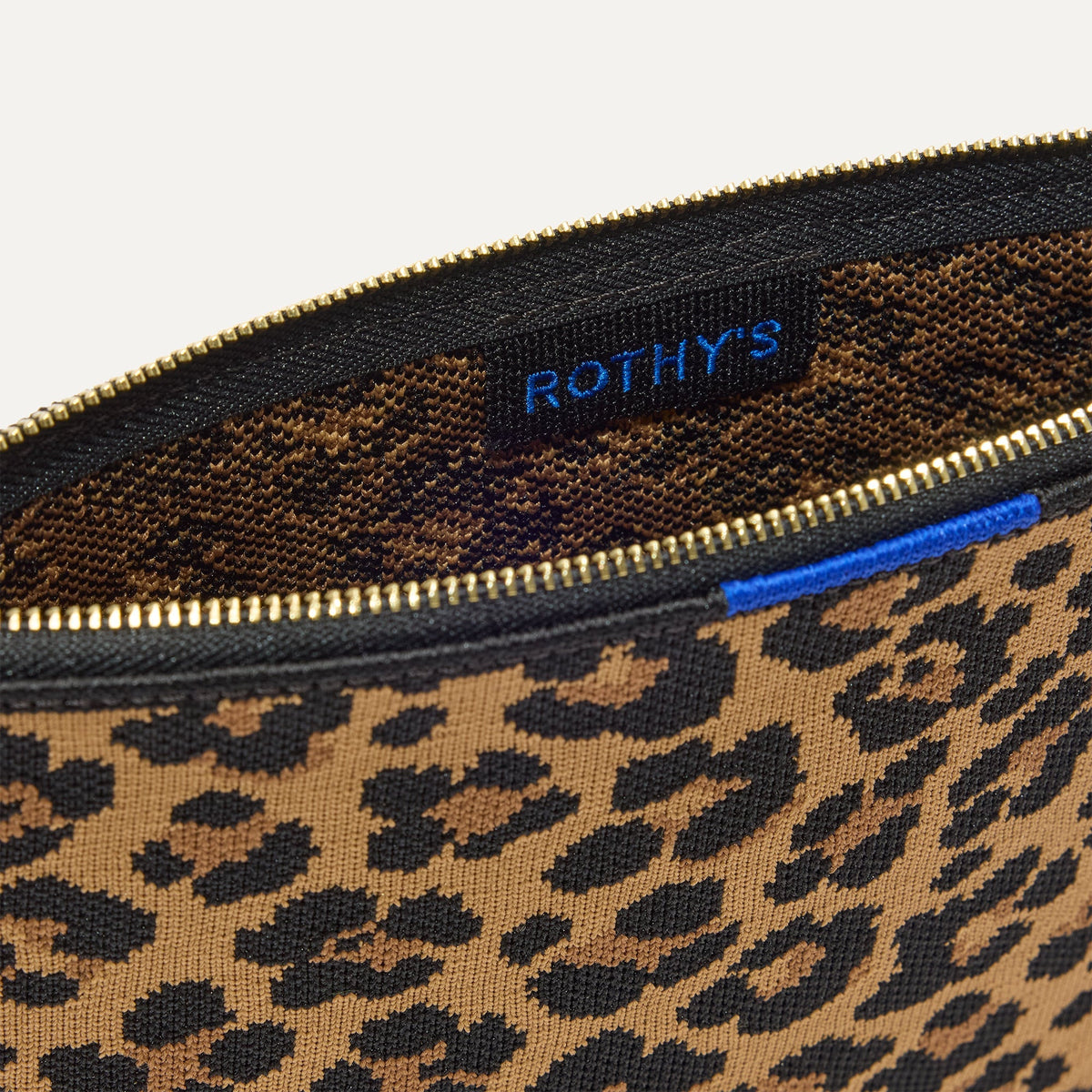 Rothys The Convertible Clutch in Toasty Cat